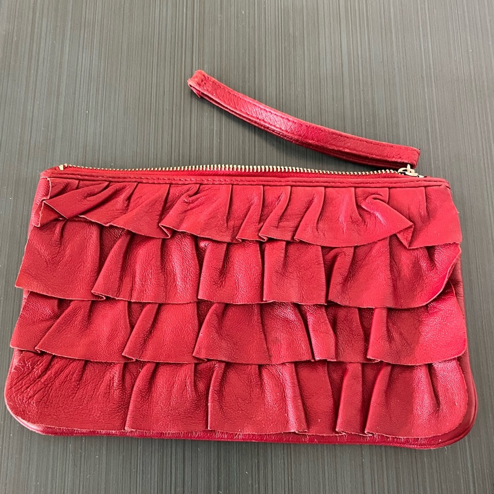 Bebe clutch/wristlet! Beautiful soft leather with the cute layered ruffles!